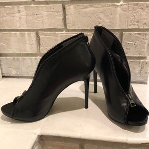 Carlos black leather heels with zipper
